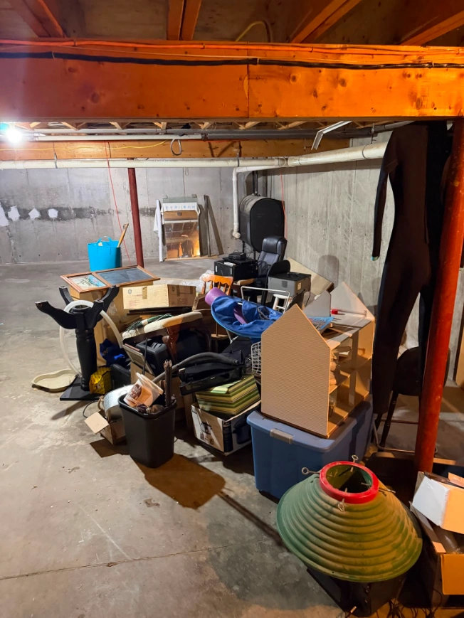 Basement cleanout before junk removal, with unwanted items